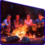 Warm cozy campfire evening at a luxury nature resort.